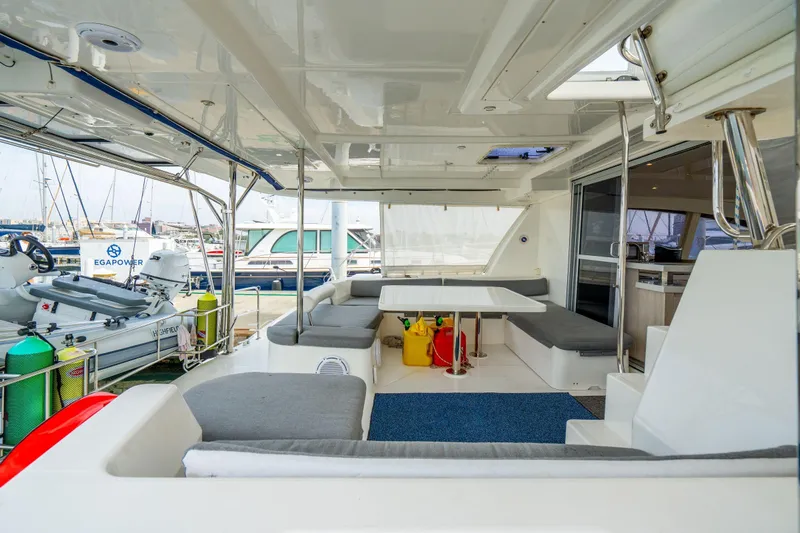 Grace Yacht Photos Pics Luxurious 2016 Leopard 48 yacht interior with spacious seating and modern amenities at the marina.