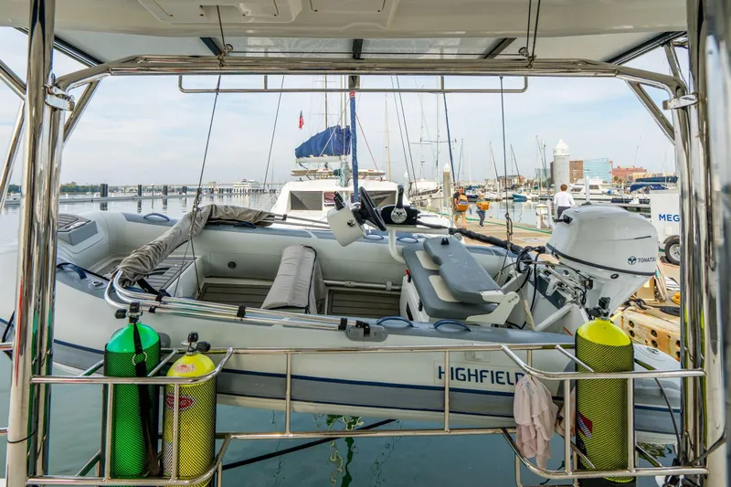 Grace Yacht Photos Pics 2016 Leopard 48 yacht with dinghy and scuba tanks at marina.