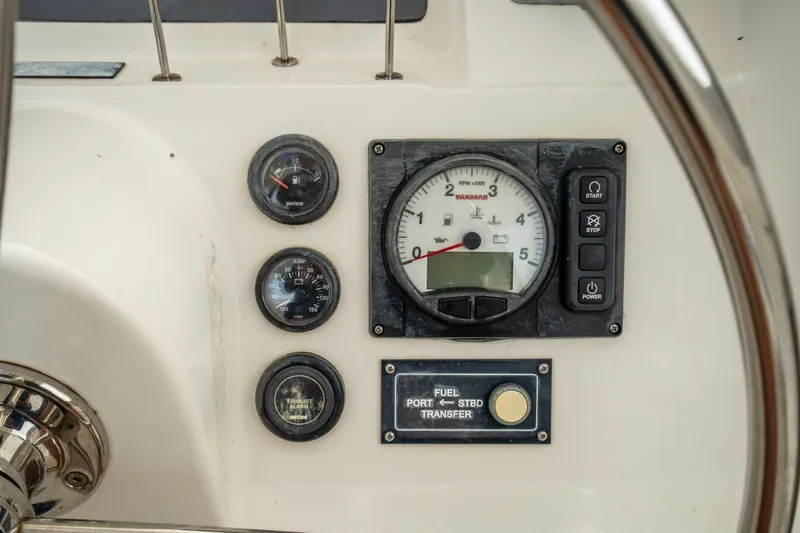 Grace Yacht Photos Pics Control panel of a 2016 Leopard 48 yacht with gauges and switches.