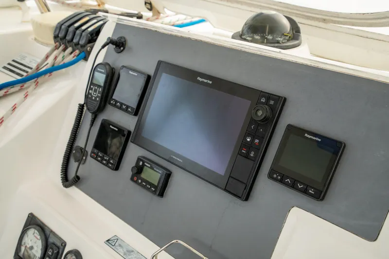 Grace Yacht Photos Pics Control panel of a 2016 Leopard 48 yacht with navigation instruments.