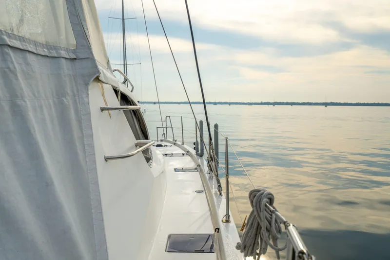 Grace Yacht Photos Pics Sailing on a 2016 Leopard 48 yacht, calm waters, serene sky.