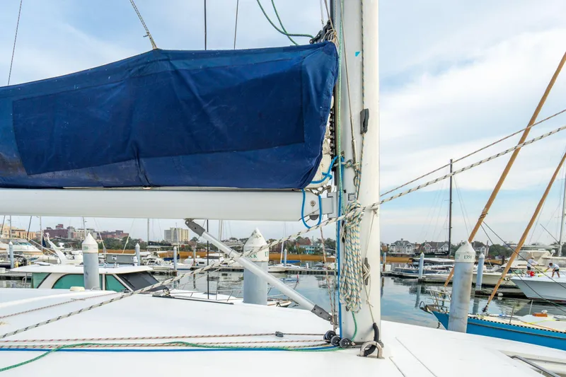 Grace Yacht Photos Pics Sailboat deck view, Leopard 48 model, 2016, docked in marina with blue sail cover.