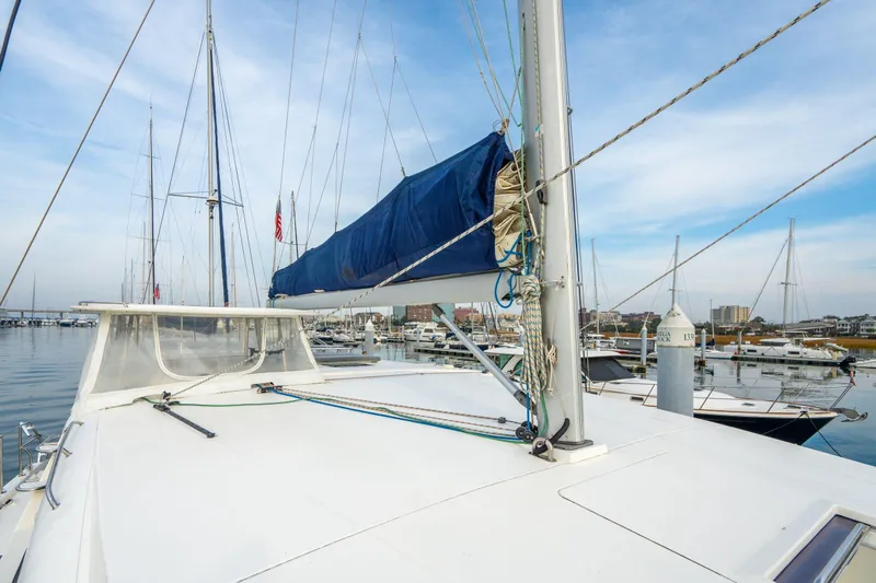Grace Yacht Photos Pics 2016 Leopard 48 yacht docked in marina, featuring sail and deck view.