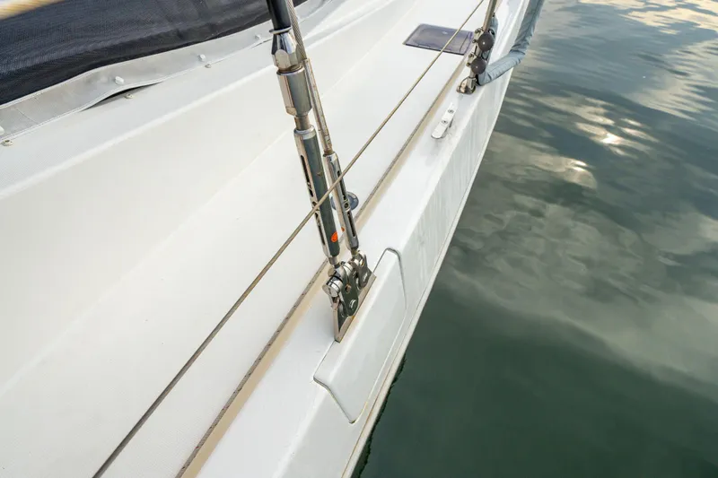 Grace Yacht Photos Pics Close-up of a 2016 Leopard 48 sailboat deck and railing over water.