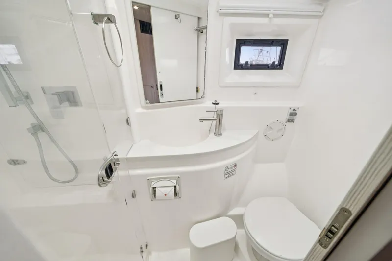 Grace Yacht Photos Pics Modern bathroom in 2016 Leopard 48 yacht, featuring sleek fixtures and compact design.