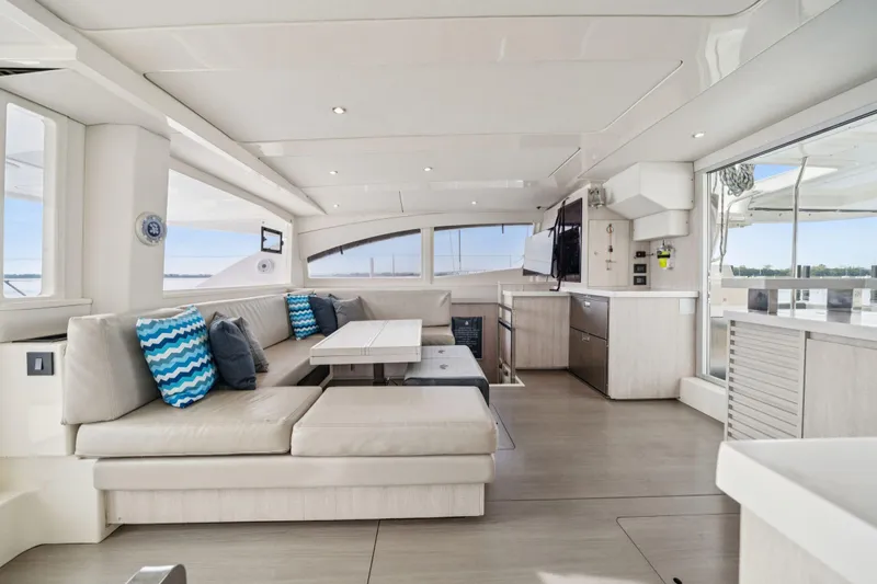 Grace Yacht Photos Pics Luxurious interior of 2016 Leopard 48 yacht with modern seating and decor.