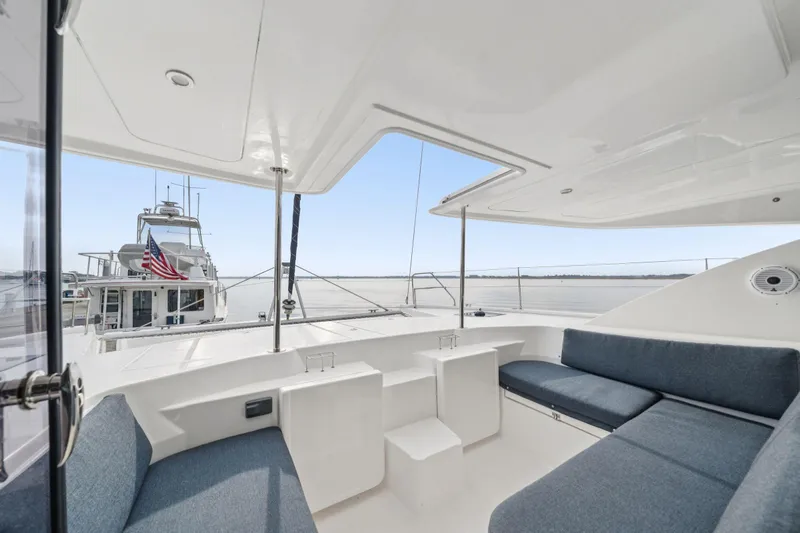 Grace Yacht Photos Pics Spacious deck of 2016 Leopard 48 yacht with comfortable seating and ocean view.