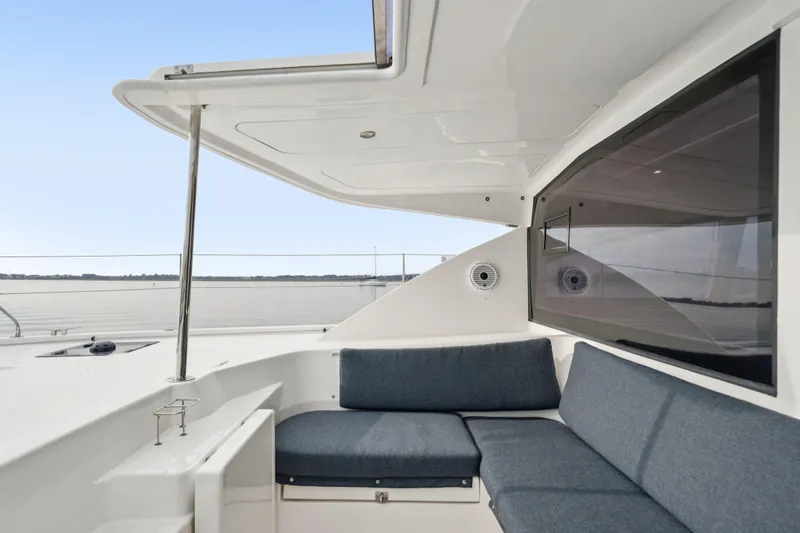 Grace Yacht Photos Pics Leopard 48 yacht interior, 2016 model, featuring a cozy seating area with ocean view.