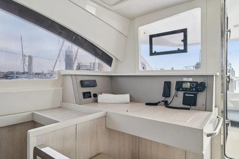Grace Yacht Photos Pics Interior of 2016 Leopard 48 yacht with navigation equipment and modern design.