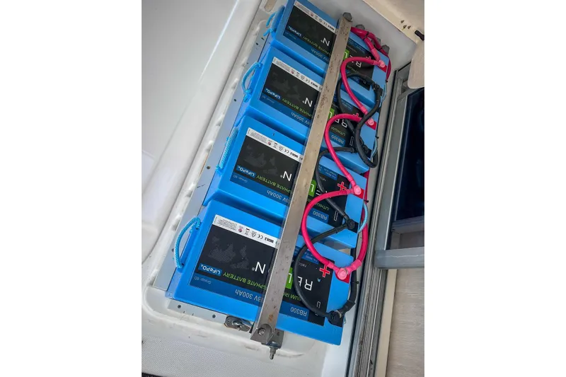 Grace Yacht Photos Pics Battery compartment of a 2016 Leopard 48 yacht with multiple blue lithium batteries.