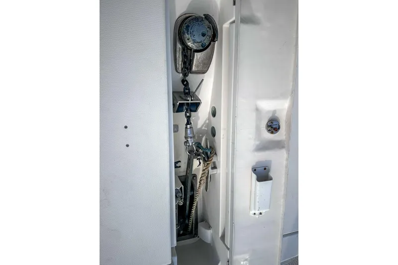 Grace Yacht Photos Pics Anchor storage compartment on a 2016 Leopard 48 yacht, featuring chain and rope.