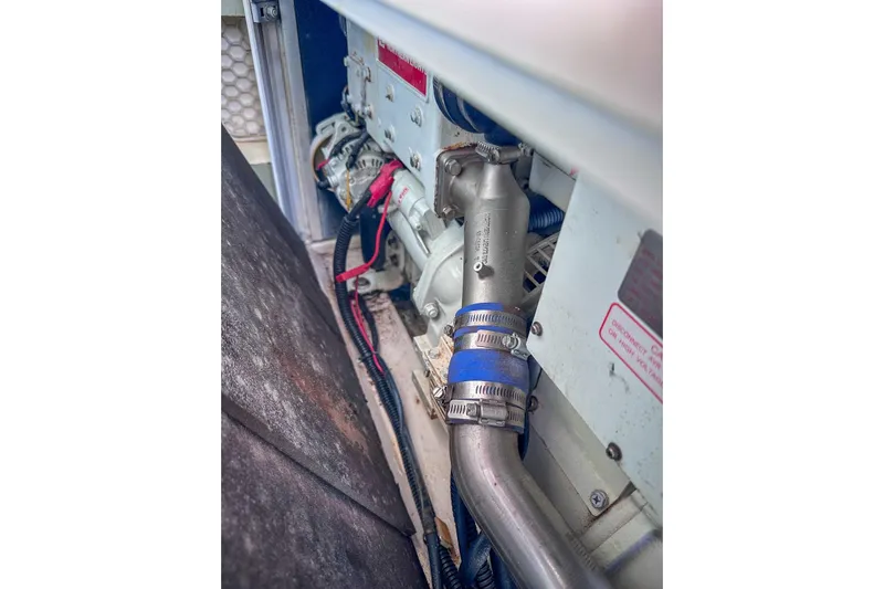 Grace Yacht Photos Pics Engine compartment of a 2016 Leopard 48 yacht, showing pipes and wiring.