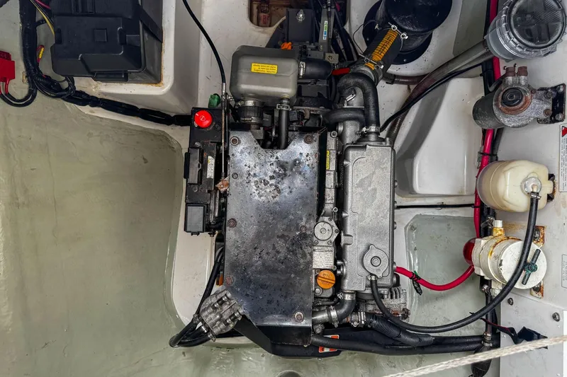 Grace Yacht Photos Pics Engine compartment of a 2016 Leopard 48 yacht, showcasing mechanical components and wiring.