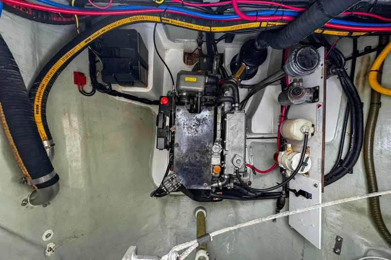 Grace Yacht Photos Pics Engine compartment of a 2016 Leopard 48 yacht, showcasing wiring and mechanical components.