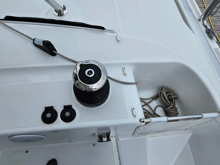  Yacht Photos Pics 2024 Lagoon 46 yacht deck with winch and coiled rope.