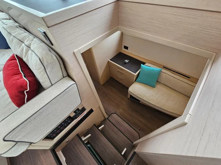  Yacht Photos Pics Interior of 2024 Lagoon 46 yacht with modern seating and wooden finishes.