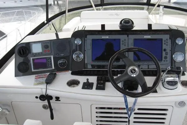  Yacht Photos Pics 2008 Sea Ray 47 Sedan Bridge helm with dual navigation screens and control panel.