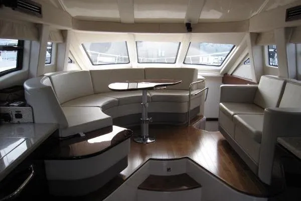  Yacht Photos Pics Luxurious interior of 2008 Sea Ray 47 Sedan Bridge yacht with elegant seating.