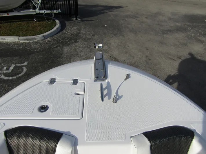  Yacht Photos Pics Bow of 2025 Wellcraft 243 Fisherman boat with anchor mount and storage hatches.