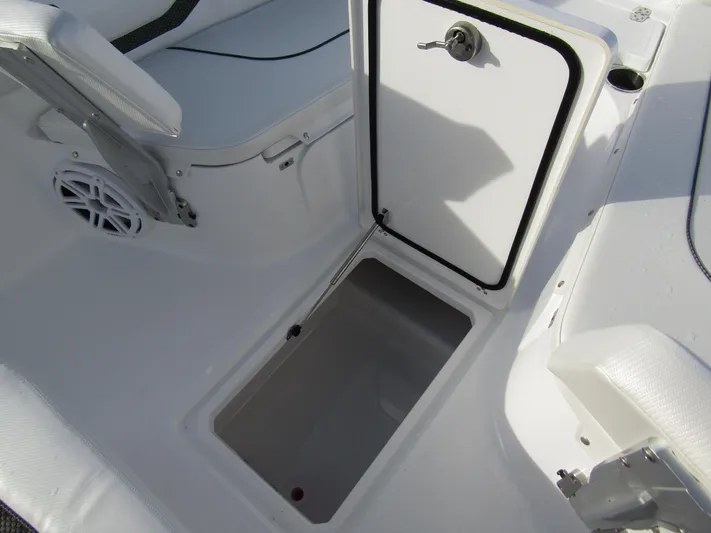  Yacht Photos Pics 2025 Wellcraft 243 Fisherman boat interior storage compartment.