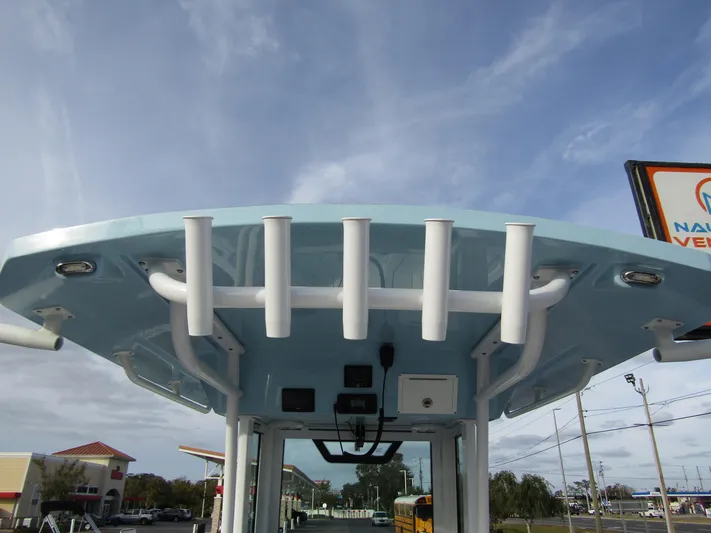  Yacht Photos Pics 2025 Wellcraft 243 Fisherman boat with rod holders and electronics, viewed from below.