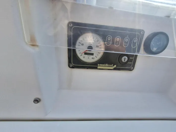  Yacht Photos Pics Control panel of a 2004 Beneteau Oceanis 423 sailboat, featuring engine gauges.