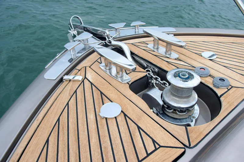  Yacht Photos Pics Bow of 2006 Riva Rivale 52 yacht with teak decking and anchor system.