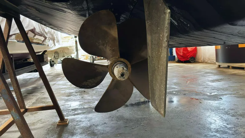  Yacht Photos Pics Propeller of 2006 Riva Rivale 52 yacht in a maintenance facility.