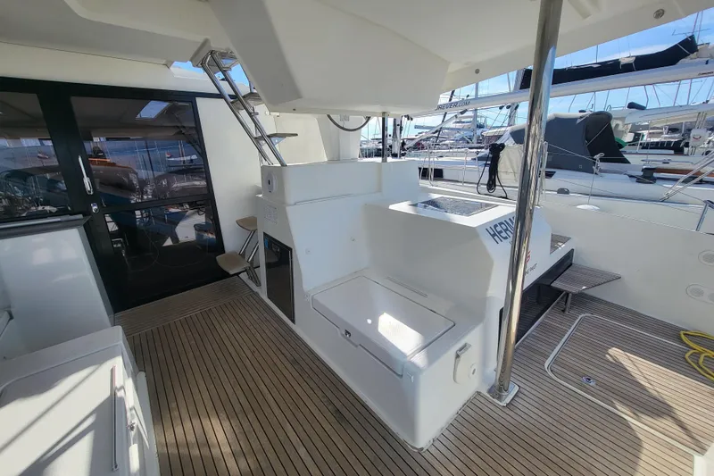  Yacht Photos Pics 2018 Fountaine Pajot Saona 47 yacht deck with modern amenities and sleek design.