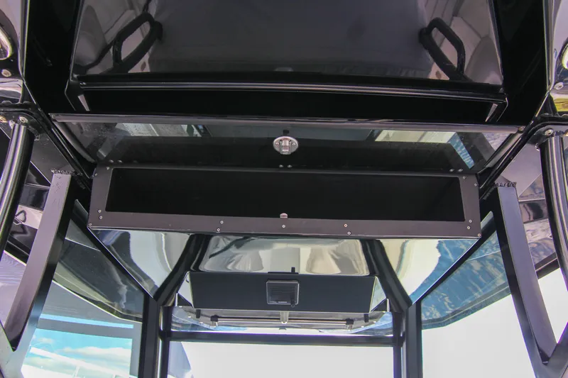  Yacht Photos Pics 2020 Blackfin 332 CC boat interior, featuring sleek black storage compartment and modern design elements.