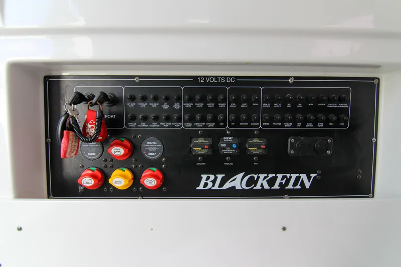  Yacht Photos Pics Control panel of 2020 Blackfin 332 CC boat with switches and keys.