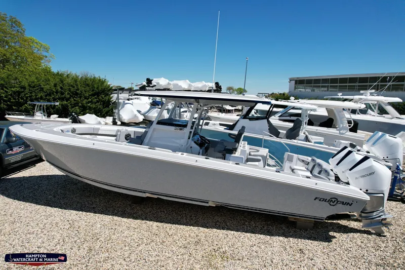 Mundinger Brokerage Yacht Photos Pics 2023 Fountain 34 SC boat displayed at Hampton Watercraft & Marine dealership.