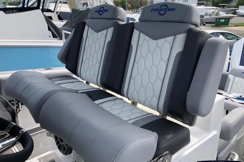 Mundinger Brokerage Yacht Photos Pics 2023 Fountain 34 SC boat seats with stylish gray and white upholstery.