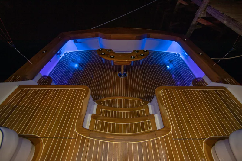 Privateer Yacht Photos Pics 2019 Jarrett Bay 67 Custom yacht deck with ambient blue lighting at night.