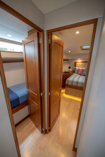 Privateer Yacht Photos Pics Luxurious interior of 2019 Jarrett Bay 67 Custom yacht with cozy bedrooms.