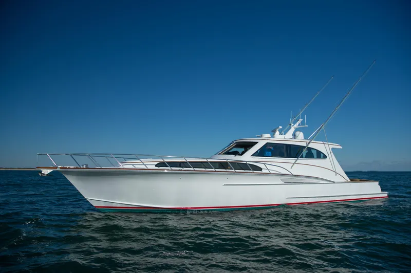 Privateer Yacht Photos Pics 2019 Jarrett Bay 67 Custom yacht on open water under clear blue sky.