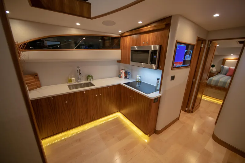 Privateer Yacht Photos Pics Luxurious kitchen interior of 2019 Jarrett Bay 67 Custom yacht with modern amenities.