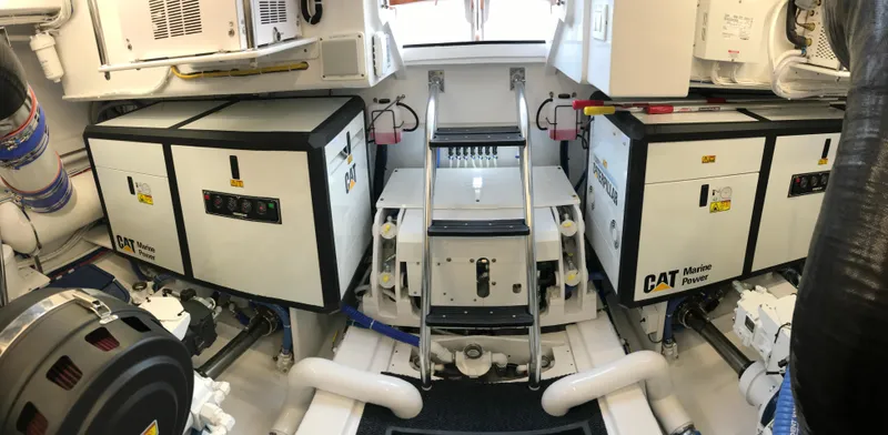 Privateer Yacht Photos Pics Engine room of a 2019 Jarrett Bay 67 Custom yacht with CAT Marine Power engines.