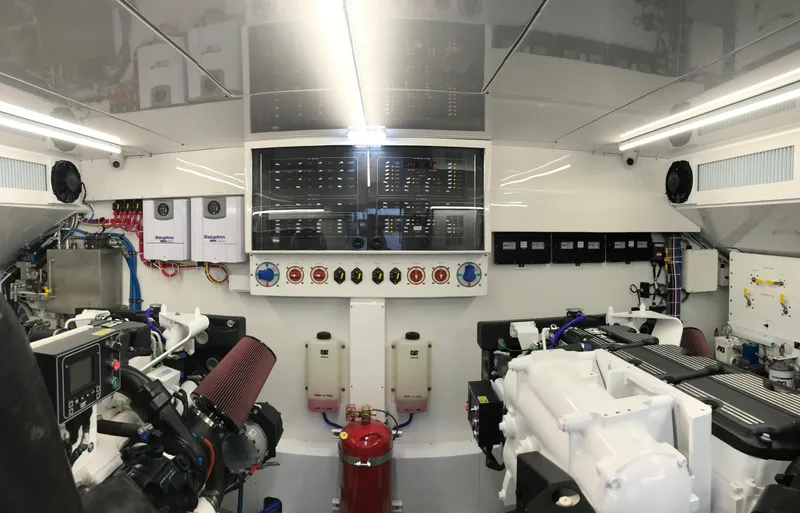 Privateer Yacht Photos Pics Engine room of a 2019 Jarrett Bay 67 Custom yacht with advanced control panels.