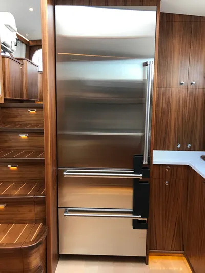 Privateer Yacht Photos Pics Stainless steel refrigerator in 2019 Jarrett Bay 67 Custom yacht kitchen.