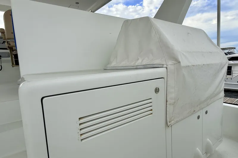 Southern Lady Yacht Photos Pics 2002 Cheoy Lee 72 Raised Pilot House Motor Yacht, covered equipment on deck.