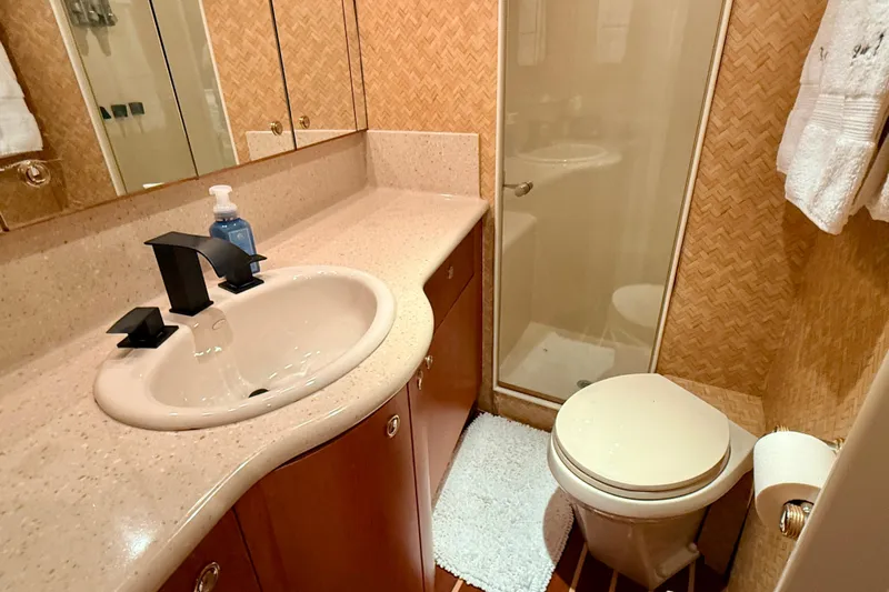 Southern Lady Yacht Photos Pics Luxurious bathroom in 2002 Cheoy Lee 72 Raised Pilot House Motor Yacht.