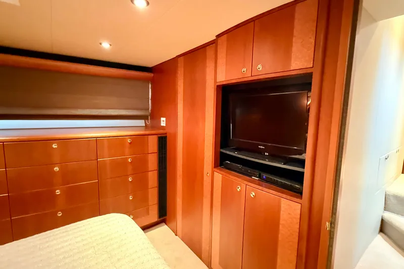 Southern Lady Yacht Photos Pics Luxurious wood-paneled interior of 2002 Cheoy Lee 72 Raised Pilot House Motor Yacht.