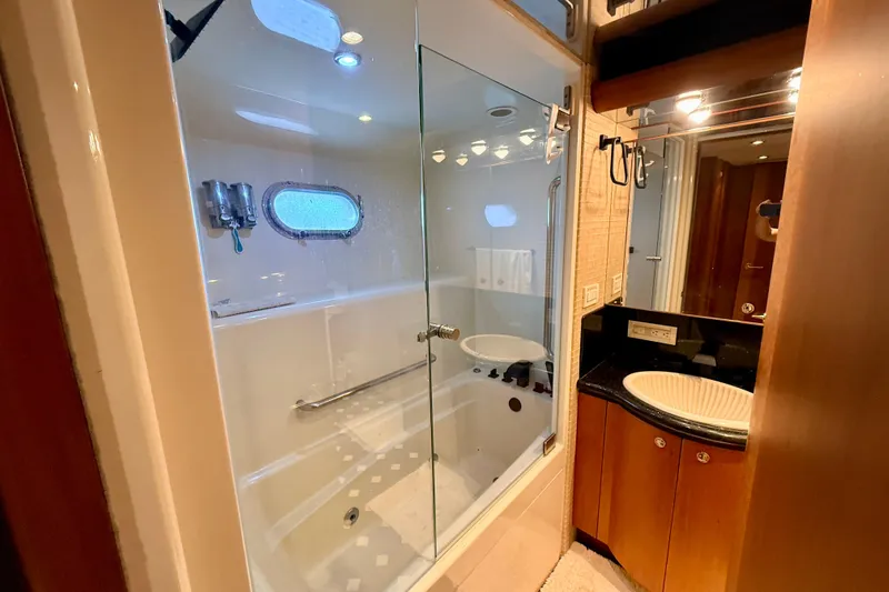 Southern Lady Yacht Photos Pics Luxurious bathroom in 2002 Cheoy Lee 72 Raised Pilot House Motor Yacht.