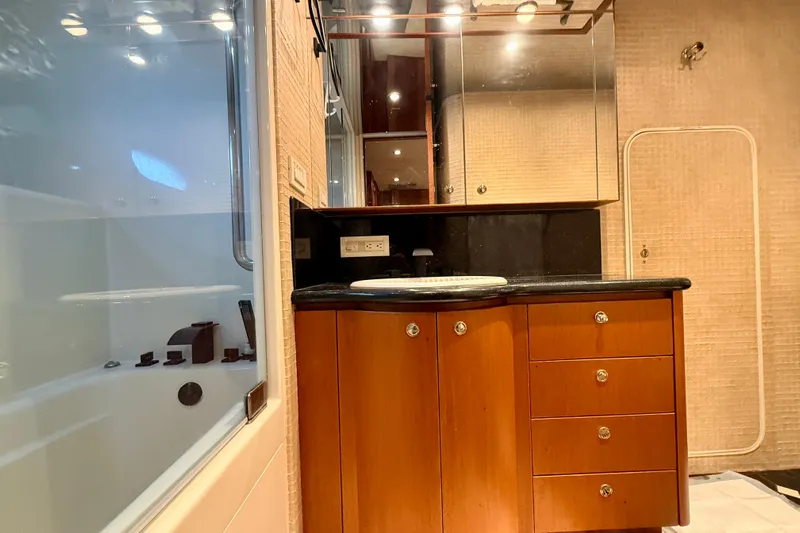 Southern Lady Yacht Photos Pics Luxurious bathroom interior of 2002 Cheoy Lee 72 Raised Pilot House Motor Yacht.