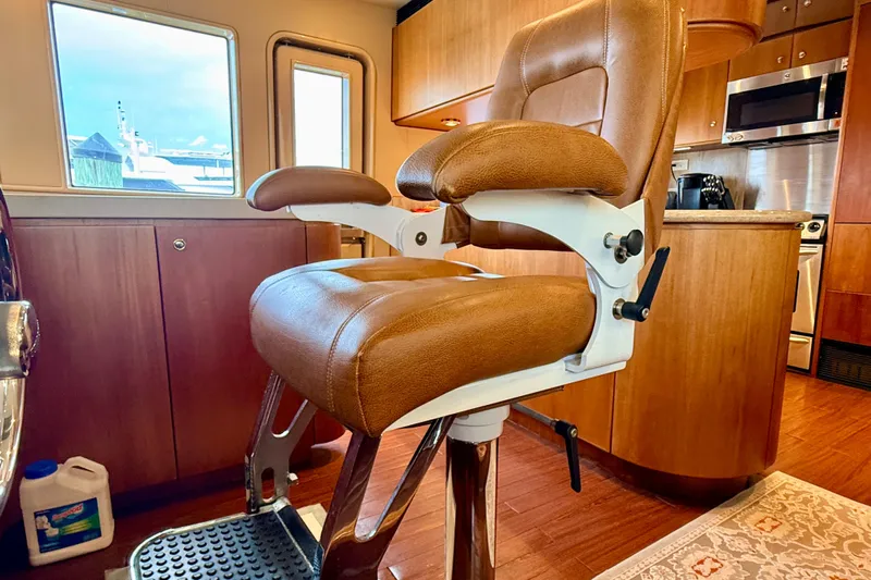 Southern Lady Yacht Photos Pics Luxurious interior of 2002 Cheoy Lee 72 Raised Pilot House Motor Yacht with captain's chair.