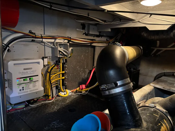 Kong Yacht Photos Pics Engine room of 2005 Silverton 38 Sport Bridge with ProNautic charger and wiring.