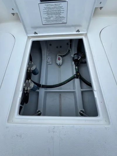  Yacht Photos Pics 2025 NorthCoast 255 HT boat compartment with visible wiring and components.