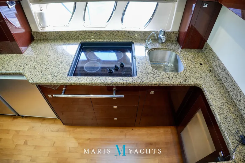 Man O War Yacht Photos Pics Luxurious kitchen area in 2009 Sea Ray 55 Sundancer yacht with granite countertops.