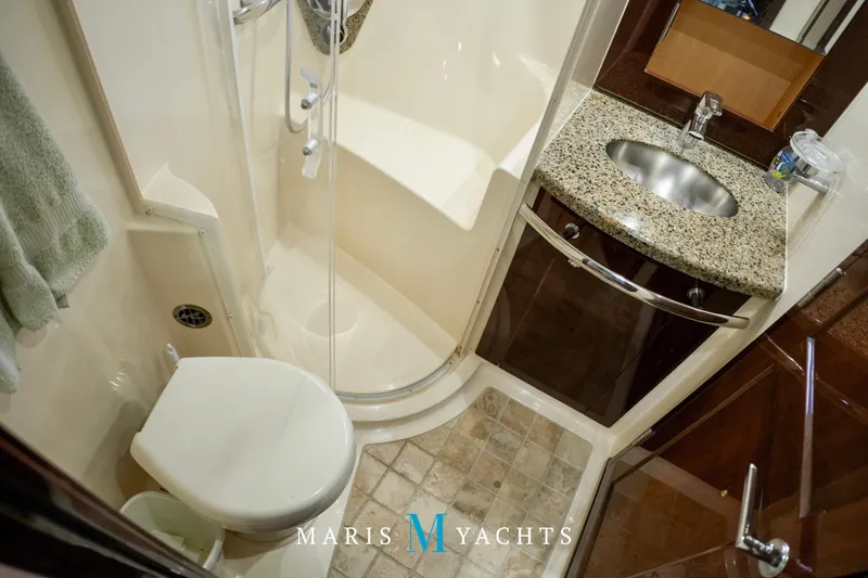 Man O War Yacht Photos Pics Luxurious bathroom in 2009 Sea Ray 55 Sundancer yacht with shower and granite sink.